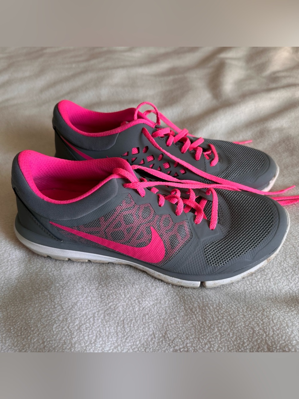 Nike Women's Gray Athletic Sneakers with Hot Pink Accents